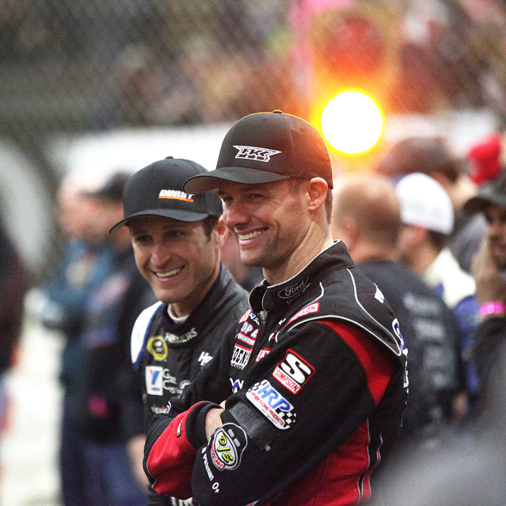 Daryn Pittman and Kasey Kahne share a laugh at The 2016 Chili Bowl in Tulsa, Oklahoma.( Jeffrey Turford / TDP )