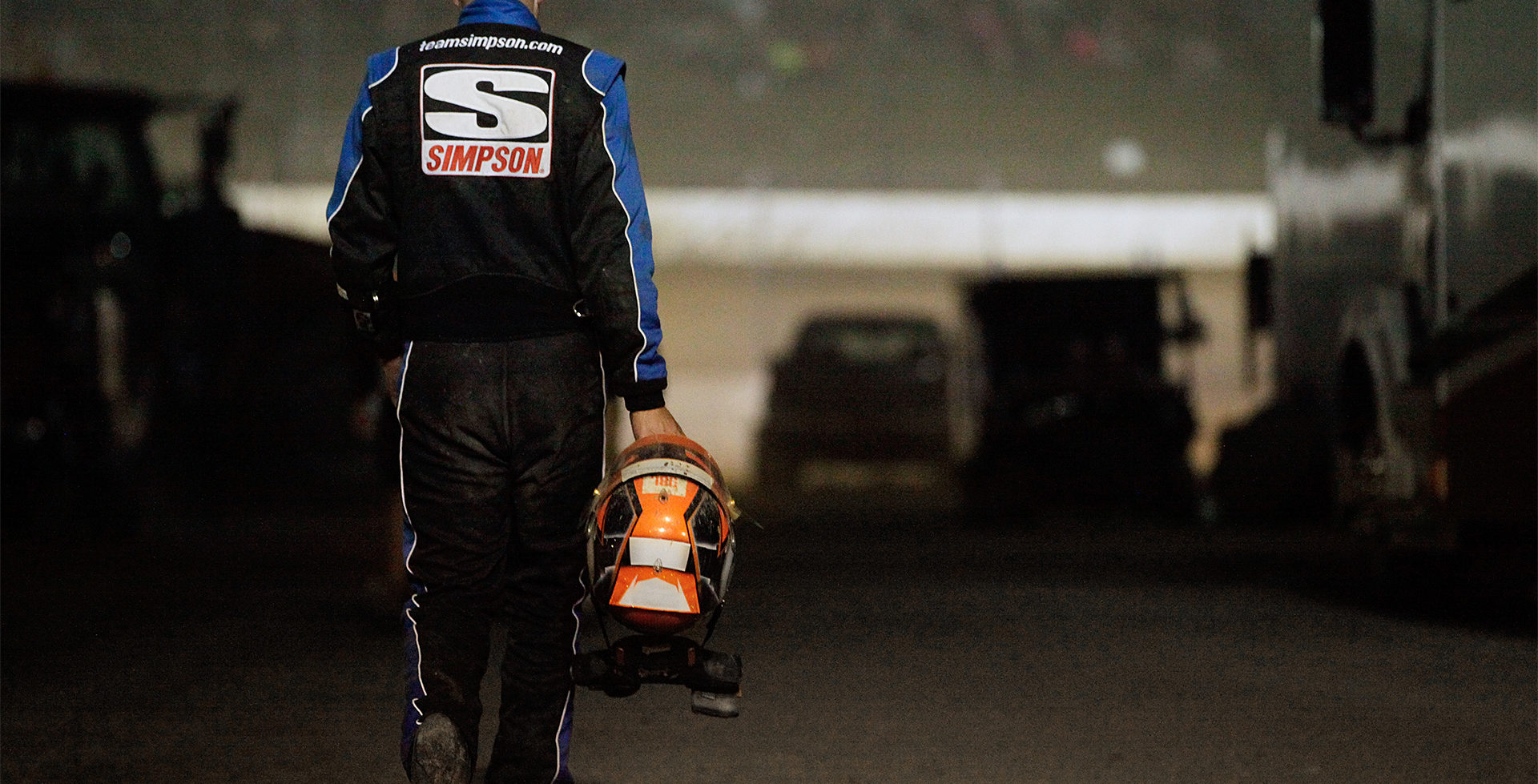 A dejected Christopher Bell walks back to the pits from his wrecked car in the late stages of the 33rd Annual Kings Royal. Bell was running 2nd before he clipped the turn 4 wall. ( Jeffrey Turford / TDP )