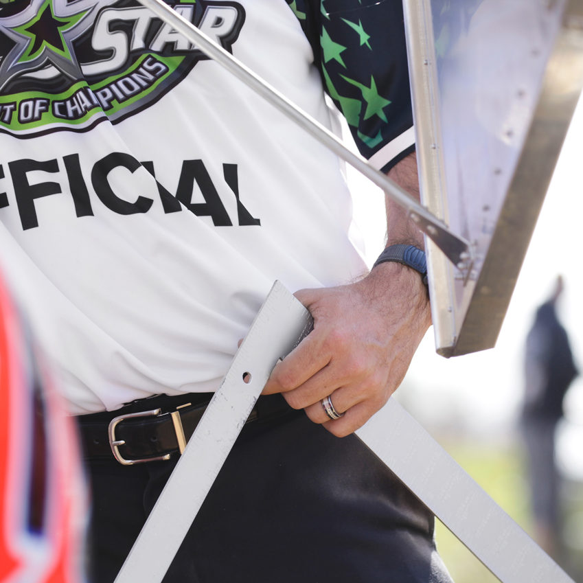 Artic Cat All Star Circuit of Champions official checks the compliance at Selinsgrove Speedway. ( Jeffrey Turford / TDP )