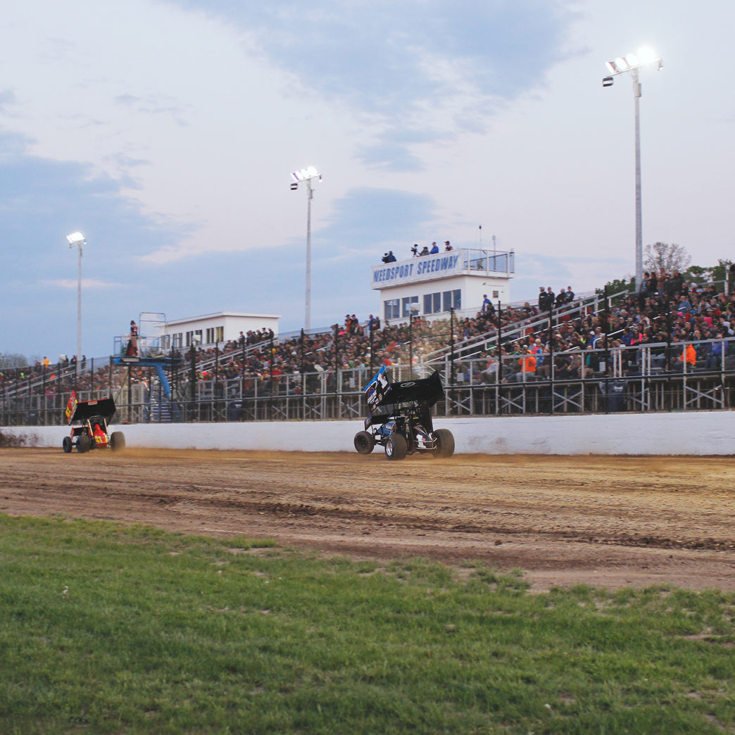 DIRT Modified star Stewart Friesen wheelie's during World of Outlaws heat race action Weedsport Speedway. ( Jeffrey Turford / TDP )