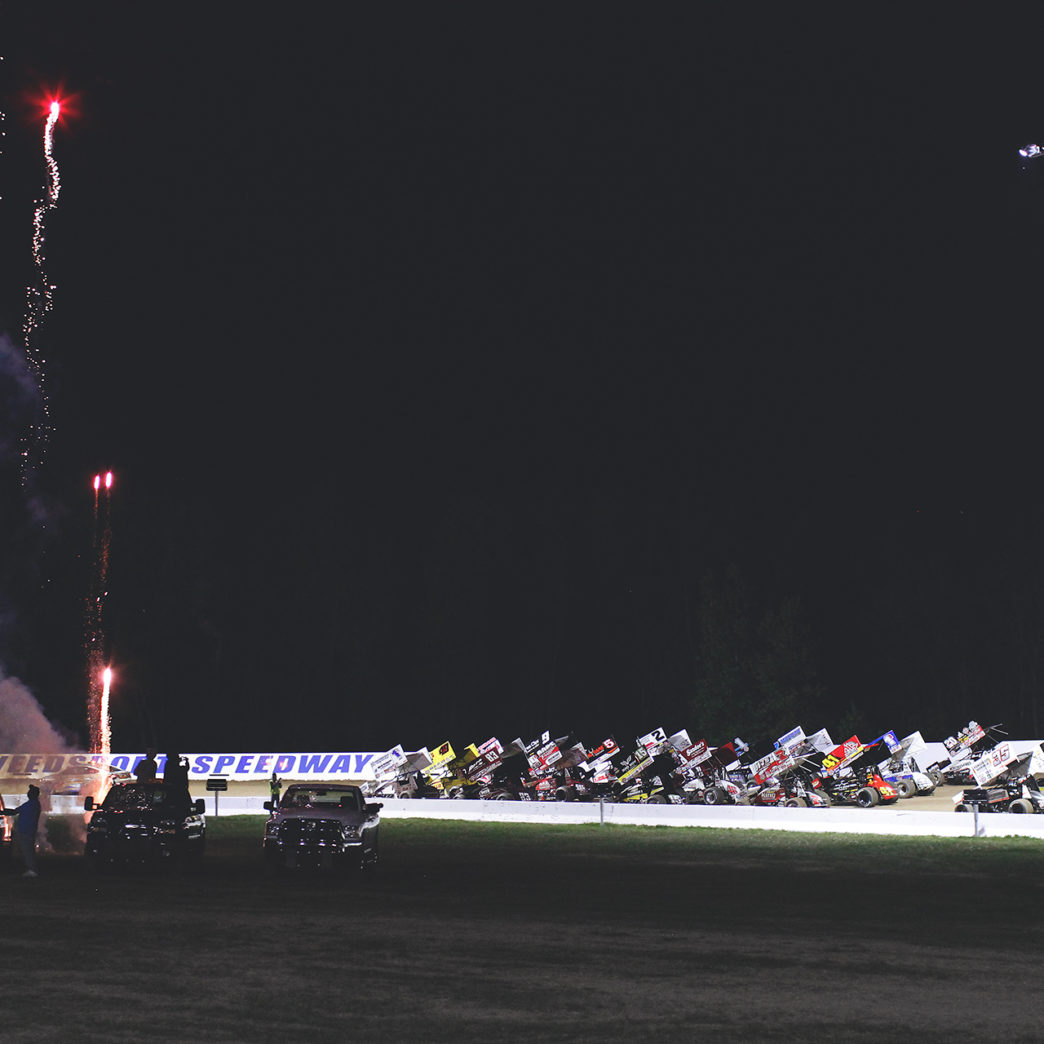 The World of Outlaws 4-wide salute to the fans at Weedsport. ( Jeffrey Turford / TDP )