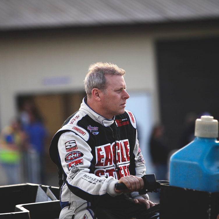 Greg Hodnett checks the track preparation before his heat race at Weedsport Speedway, NY. ( Jeffrey Turford / TDP )