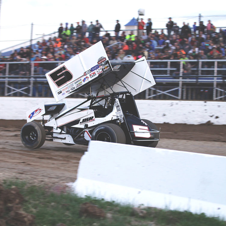 Justin Barger gets some bite and lifts the front end during heat races with The World of Outlaws at Weedsport 2016. ( Jeffrey Turford / TDP )