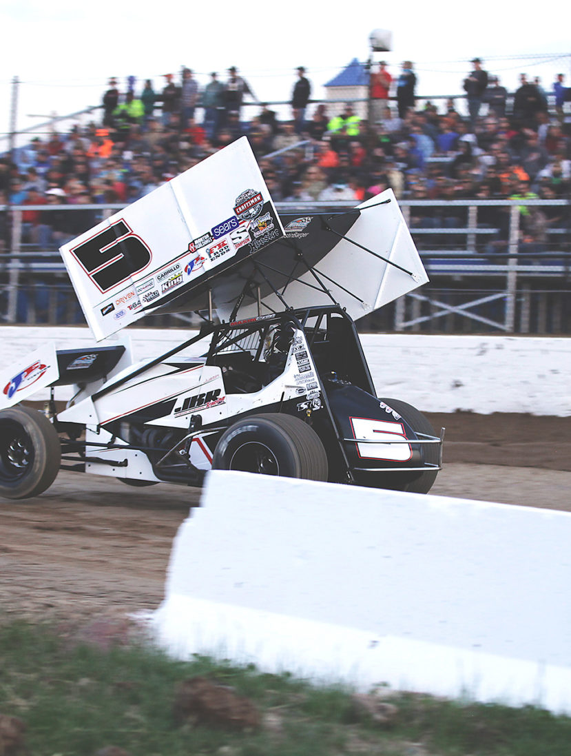 Justin Barger gets some bite and lifts the front end during heat races with The World of Outlaws at Weedsport 2016. ( Jeffrey Turford / TDP )