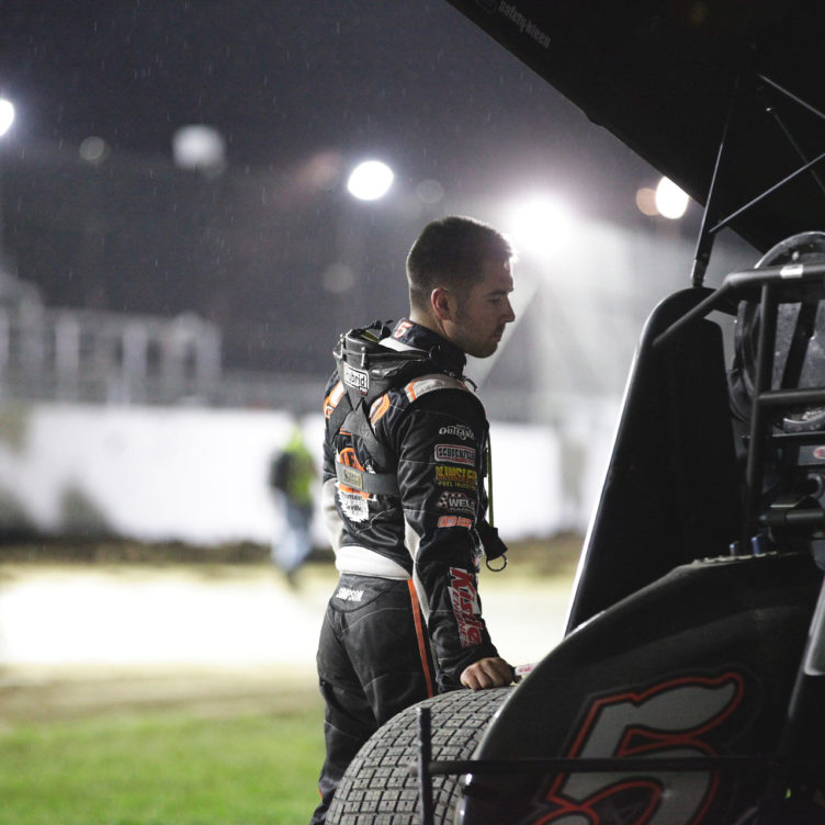 Rain falls as 3rd place finisher David Gravel reflects on a strong World of Outlaws feature race Weedsport Speedway. ( Jeffrey Turford / TDP )
