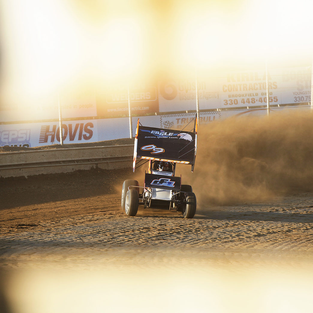 The 09X of Carson Macedo leaves a dirt storm in its wake during qualifying at Sharon Speedway. Macedo qualified 27th of 51 cars at a packed ASCoC event at Sharon Speedway during Ohio Speedweek. ( Jeffrey Turford / TDP )