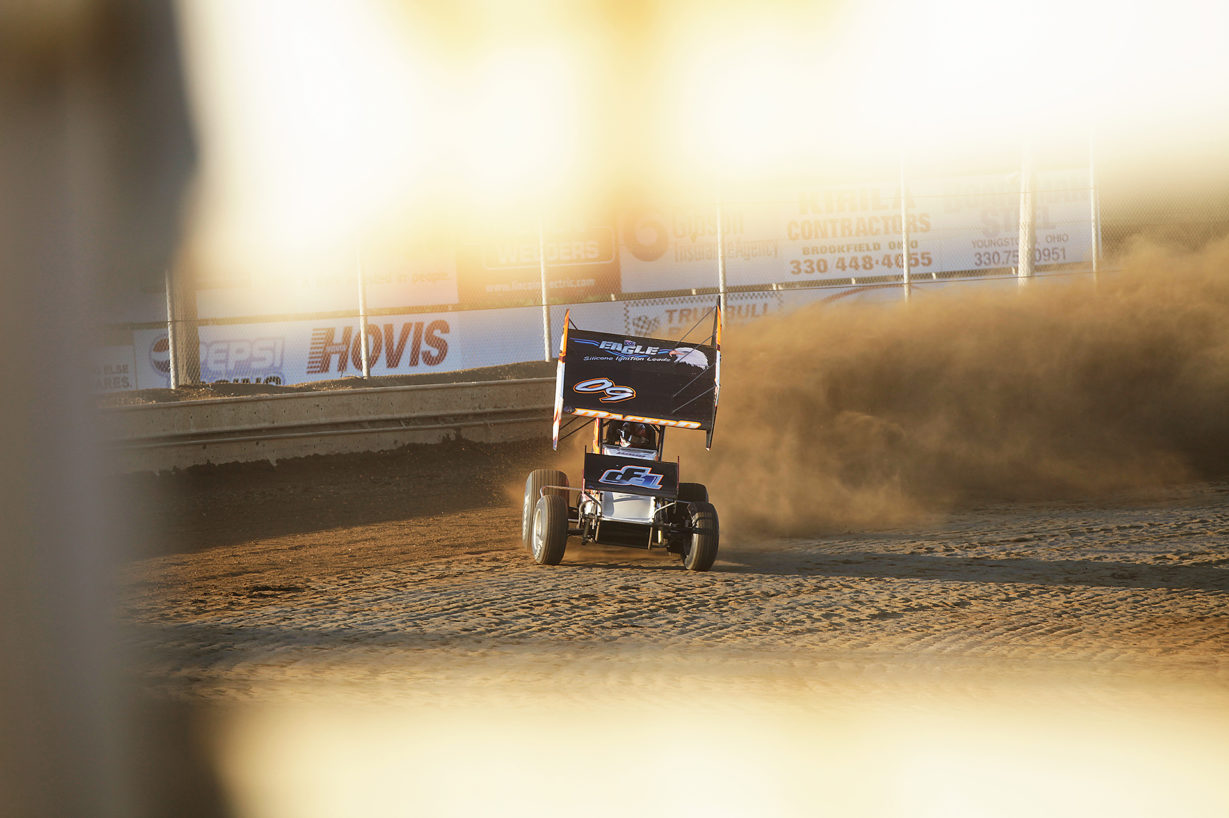 The 09X of Carson Macedo leaves a dirt storm in its wake during qualifying at Sharon Speedway. Macedo qualified 27th of 51 cars at a packed ASCoC event at Sharon Speedway during Ohio Speedweek. ( Jeffrey Turford / TDP )