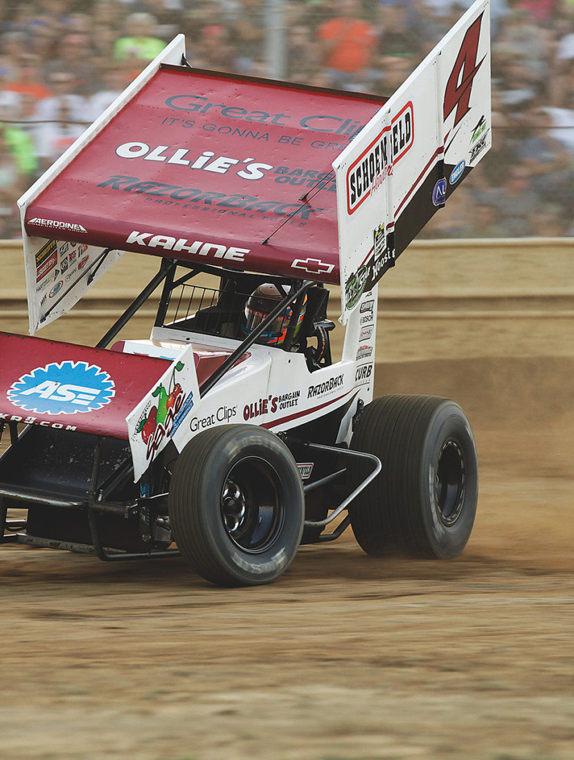 Kasey Kahne leans hard into turn 1 at Sharon Speedway with the ASCoC. Kahne ran 5th in his heat and was able to win the B Feature to transfer to the A Feature event at Sharon Speedway. ( Jeffrey Turford / TDP )