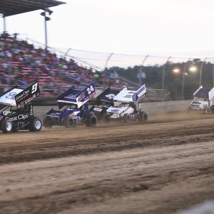 Daryn Pittman leads a stacked field of Rico Abreu, Christopher Bell, Paul McMahan, Kyle Larson, Shane Stewart and David Gravel and Joey Saldana in to the first turn in the dash race at Lawrenceburg Speedway, IN. ( Jeffrey Turford / TDP )
