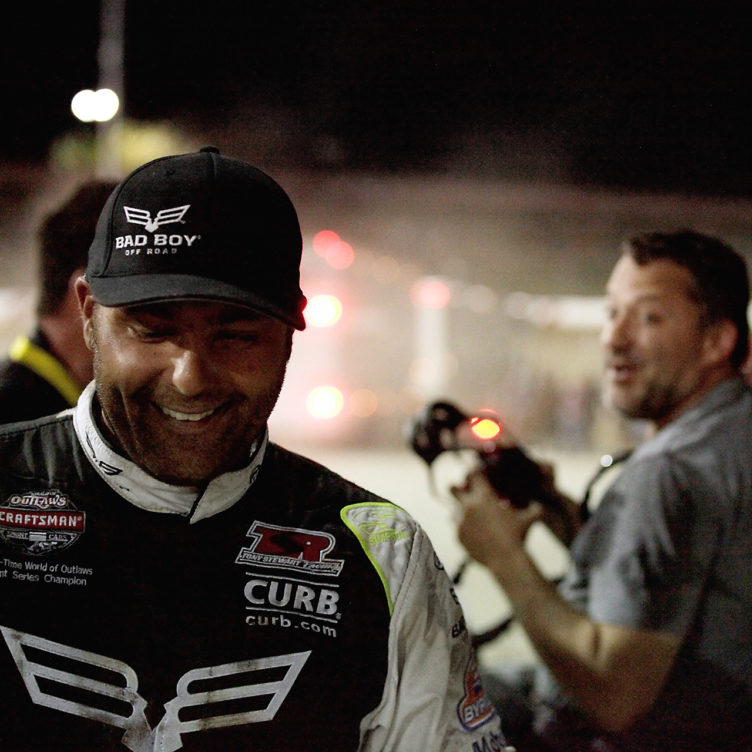 Donny Schatz and Tony Stewart share a laugh in victory lane following the Friday night Feature. ( Jeffrey Turford / TDP )