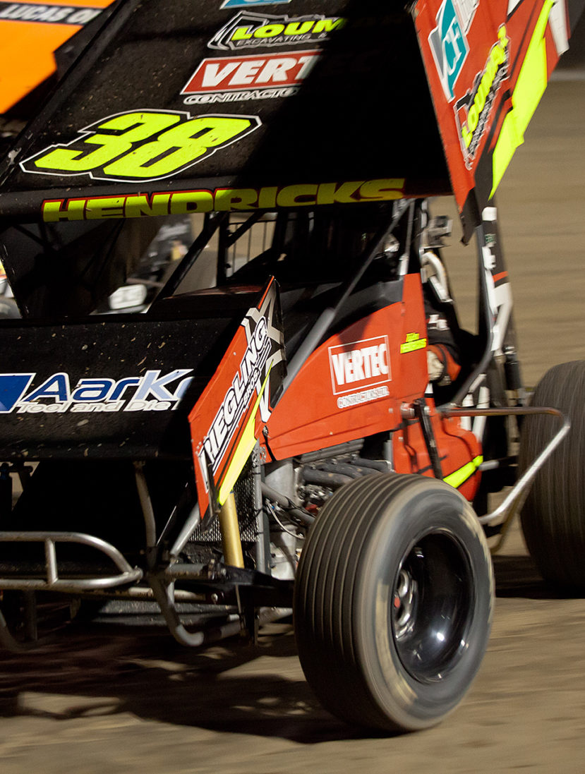 No.38 Tyler Hendricks, 28fm Steve Poirier and no.53 Shawn Donath go 3-wide into turn 2 at Ohsweken Speedway ( Jeffrey Turford / TDP )