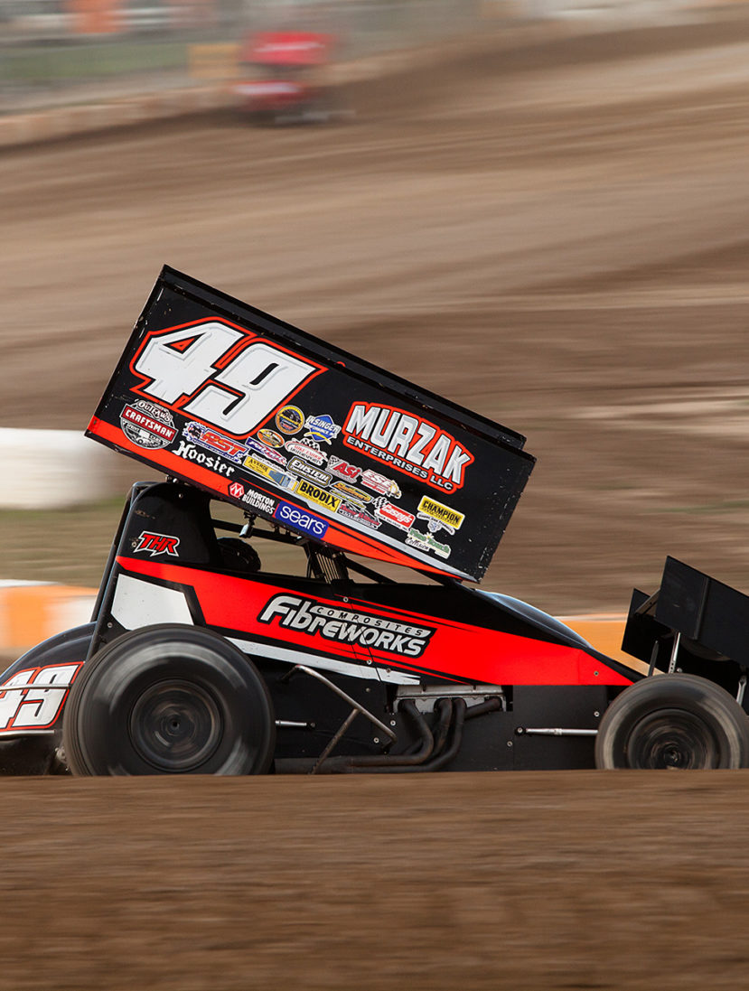 no.49 Scott Kreutter on the gas through turn 4 at Ohsweken Speedway ( Jeffrey Turford / TDP )