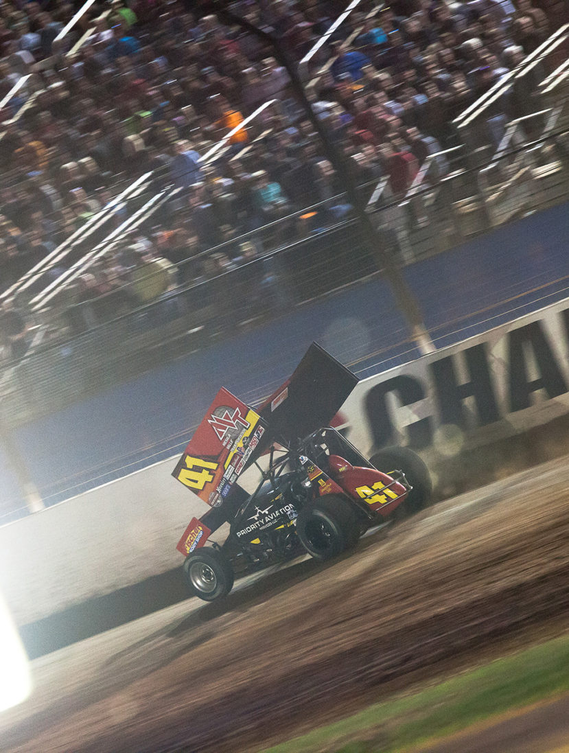 Jason Johnson crosses the finish line to win the Friday night Feature race at The 2016 WoO World Finals in Charlotte, NC. ( Jeffrey Turford / TDP )