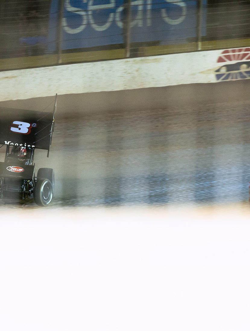No. 3g Carson Macedo rounds turn 4 at The Dirt Track at Charlott. Macedo finished the Friday night C-Main in 3rd, just 1 spot shy of last transfer spot to the Last Chance Showdown at The Dirt Track at Charlotte for WoO World Finals. ( Jeffrey Turford / TDP )