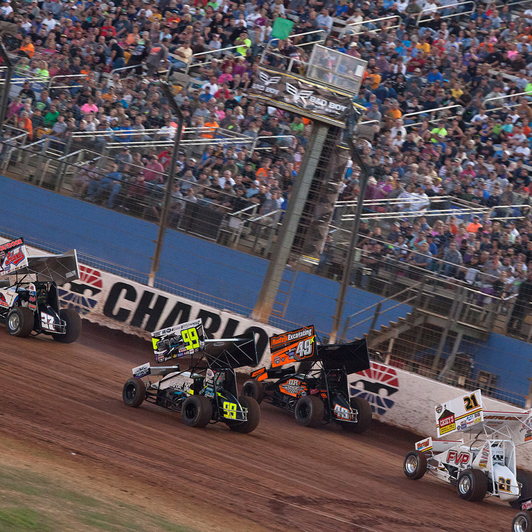 Greg Hodnett leads the 8 car Heat 1 field on the final day of the 2016 World of Outlaws World Finals in Charlotte, NC. ( Jeffrey Turford / TDP )