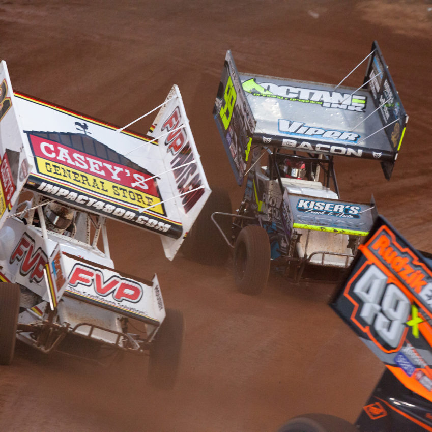No. 21 Brian Brown, 99 Brady Bacon and the 49x of Tim Shaffer battle for the final transfer spot in Heat 1 at WoO World Finals in 2016. ( Jeffrey Turford / TDP )