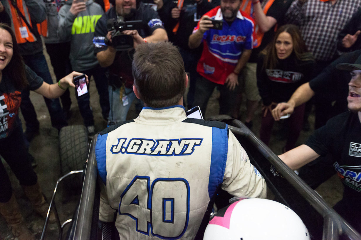 Friday January 13, 2017 TULSA, Oklahoma - Friday January 13, 2017 TULSA, Oklahoma - No. 39bc, Justin Grant shares his victory with wife and twin newborns, over a cellphone on Vacuworx Qualifying Night, of The 31st annual Lucas Oil Chili Bowl Nationals presented by General Tire ( Jeffrey Turford / TDP )