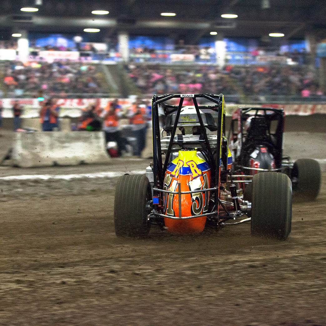 Friday January 13, 2017 TULSA, Oklahoma - No. 51R Brody Roa on the hammer into turn 3, battling Dave Darland for passing points in qualifier Race 2 at The 2017 Chili Bowl Nationals ( Jeffrey Turford / TDP )