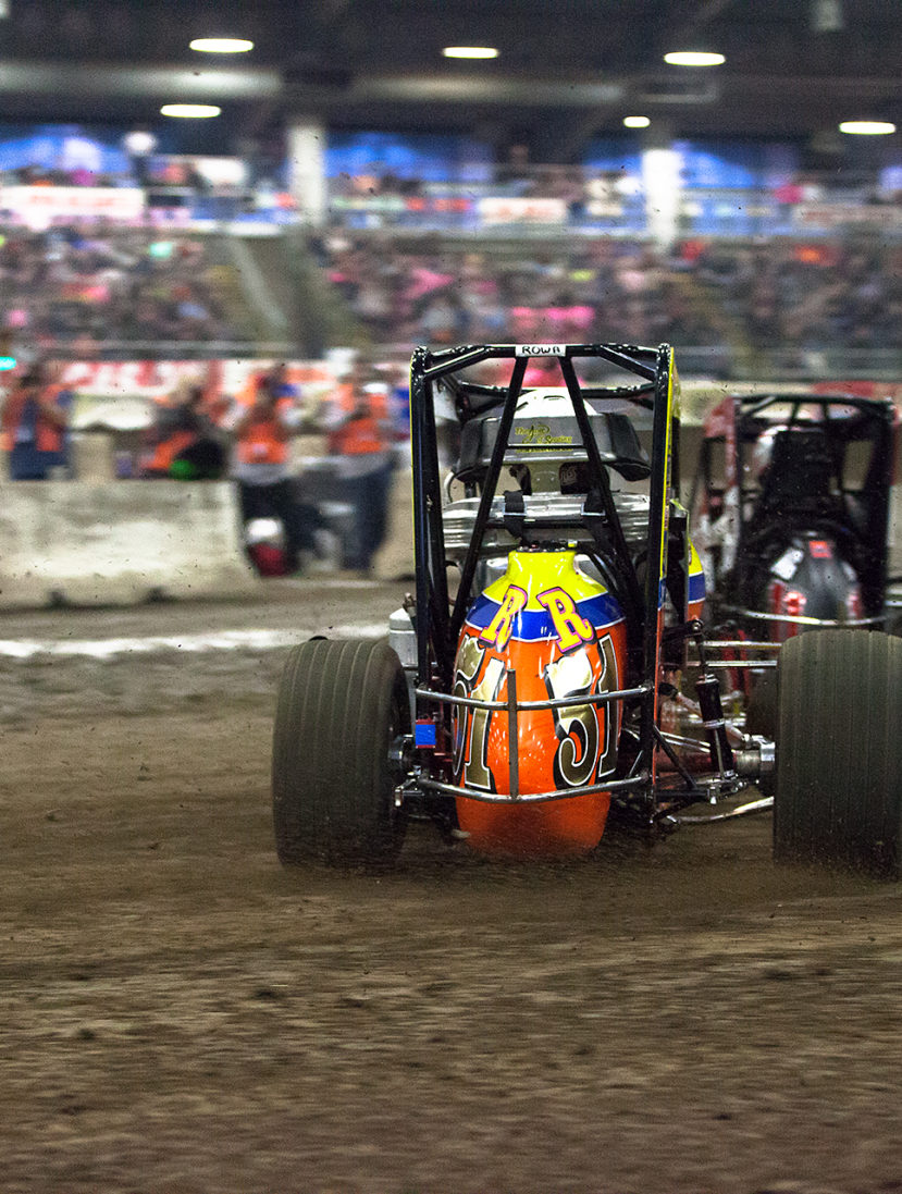Friday January 13, 2017 TULSA, Oklahoma - No. 51R Brody Roa on the hammer into turn 3, battling Dave Darland for passing points in qualifier Race 2 at The 2017 Chili Bowl Nationals ( Jeffrey Turford / TDP )