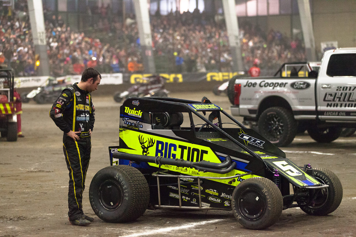 Saturday January 14, TULSA, Oklahoma - 2016 ARCA Racing Champion, Chase Briscoe, looks on disappointingly at a bent rear shock on his Big Tine sponsored, Cunningham Motorsports Midget ( Jeffrey Turford / TDP )