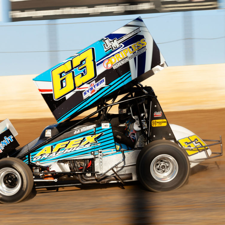 No. 63 J.J. Hickle battles through turn 2 during his qualifying run on day 1 of the Lake Ozark Speedway Memorial Weekend Sprint and Midget Nationals. ( Jeffrey Turford / TDP )