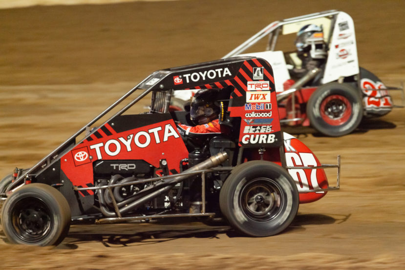 No.67K Cade Lewis sneaks under the 21K of Karter Sarff at Lake Ozark Speedway during the Saturday night Feature. ( Jeffrey Turford / TDP )