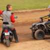 Sprint drivers J.J. Hickle (left) and Derek Hagar (right) chit chat during track prep on Sunday of the Lake Ozark Speedway Memorial Weekend Sprint and Midget Nationals. ( Jeffrey Turford / TDP )