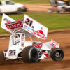 The No.21H of Brian Brown on the gas hard through turn 4 during time trials during the Memorial Weekend Sprint and Midget Nationals. ( Jeffrey Turford / TDP )